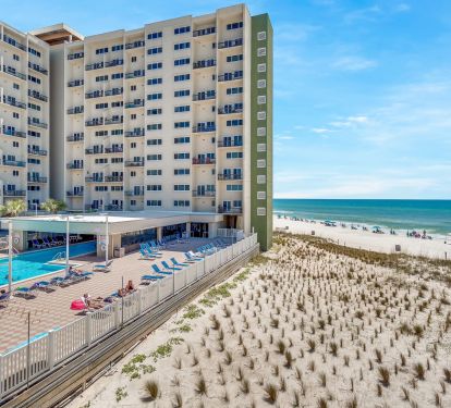 View of Large Pool &amp; Beach from Balcony