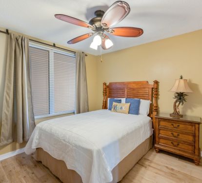The middle bedroom also has new tile, plus direct access to the guest bathroom