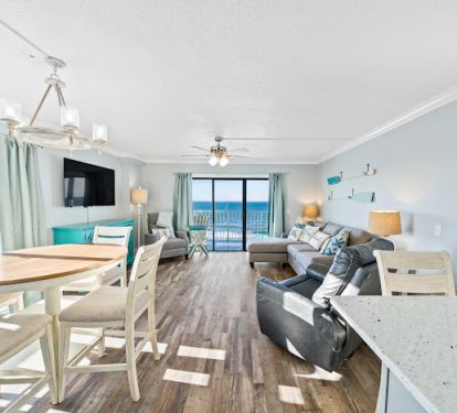 Spacious living room with access to the wrap around balcony.