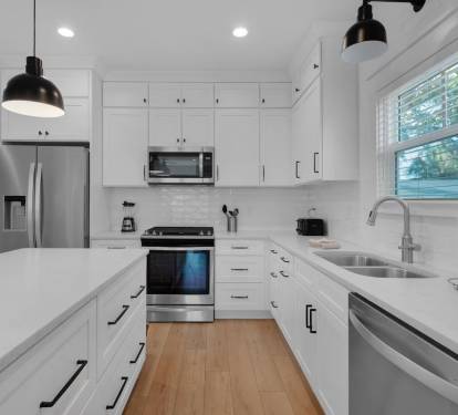 Fully stocked gourmet kitchen with storage galore.