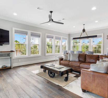 Living room boasts iconic, coastal view and smart tv