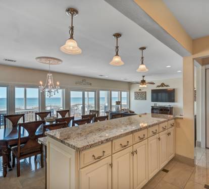 View of Ocean from Kitchen through Floor-to-Ceiling Windows