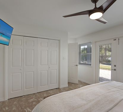 Lower level king with direct patio access.
