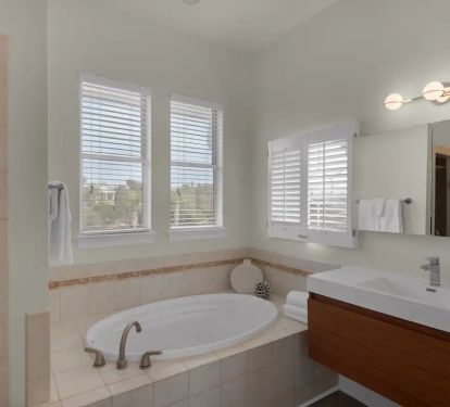 Aqua-23 Garden tub and floating vanity in king suite #3.