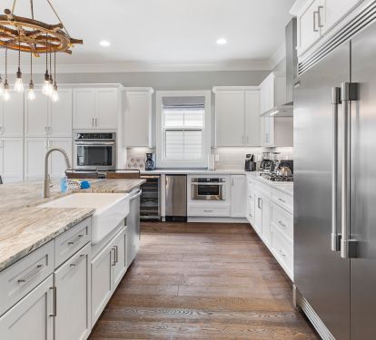 Kitchen has: industrial fridge, beverage fridge, and ice maker