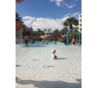 Zero entry pool, community gym overlooking pool