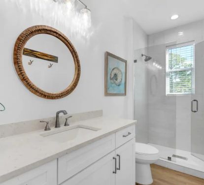 Driftwood-15 Bedroom 1 Bath. PIc 1. King with attached bath with quartz vanity and frameless glass shower