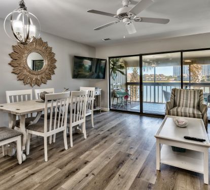 Living room leads out to large screened in deck