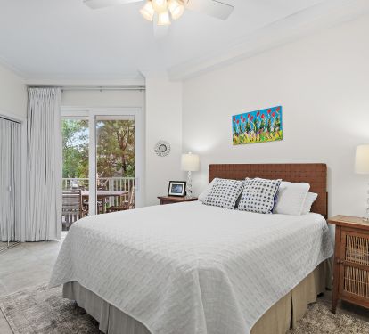 Queen Bedroom With Private Bath and Walkout To Main Balcony