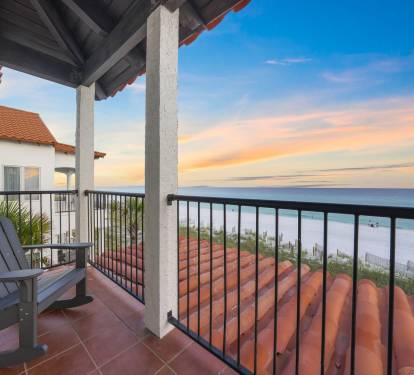 Balcony with two rocking chairs. The perfect place to watch a sunrise or sunset.