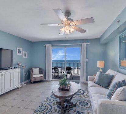Spacious Living Room with views of the Beautiful Gulf of Mexico and access to Private Balcony and Full Size Sleeper Sofa