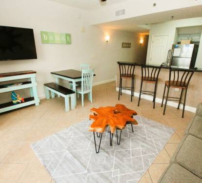 Spacious living room with new 55 inch smart TV