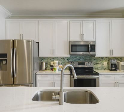 Full kitchen with stainless steel appliances