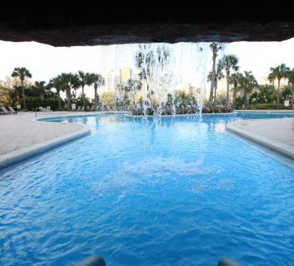 Pool waterfall that you can swim under or walk behind