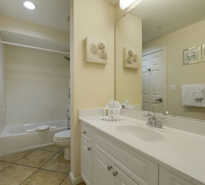 From sandy toes to evening dinners, this well appointed bathroom supports every part of your beachfront routine.