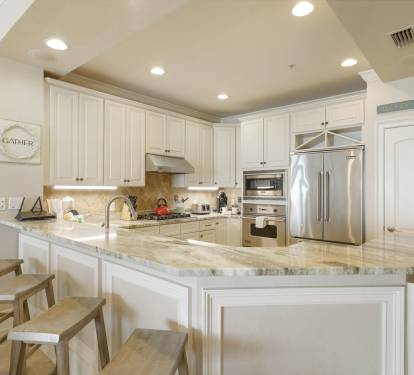 Take a spot at the bar while you prepare your faborite meals or drinks with chef inspiring seating and dining