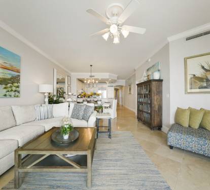 Relax on the comfy living room furniture while you catch your favorite show whether on cable or stream