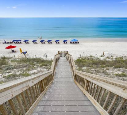 Just a few steps away from this 30a beachfront paradise! Don't forget your beach service locate to the right of the walkover!