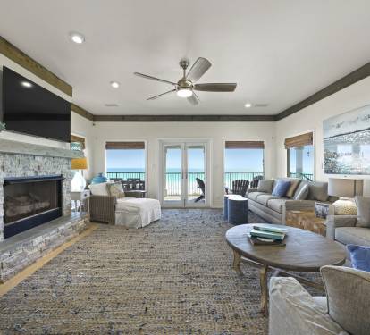 Recently updated, this stunning living room has ample seating for all guests to gather for TV time or a game night!