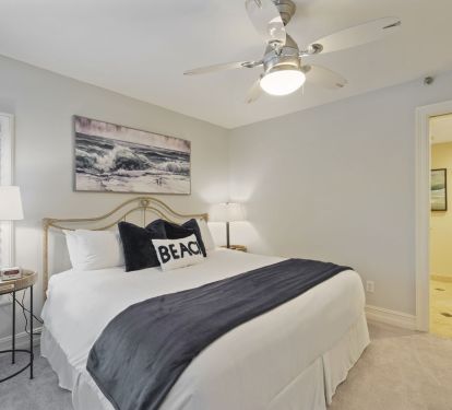 The spacious layout and soothing color palette make this bedroom an ideal sanctuary for your Destin vacation rental stay.
