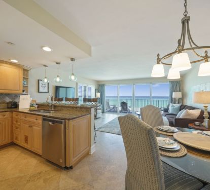 Experience effortless beachside living with a bright, functional kitchen overlooking the sparkling Gulf.
