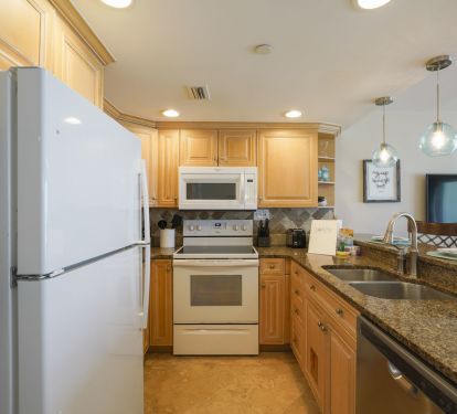 The fully stocked kitchen in this oceanfront condo is perfect for extended beach vacations.