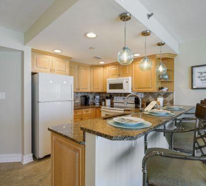 Enjoy morning coffee at the breakfast bar before heading out to the white sand beaches.