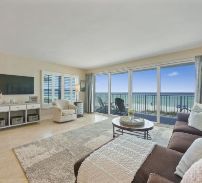 Bright beachfront condo in Destin, FL featuring private balcony access and panoramic Gulf scenery.