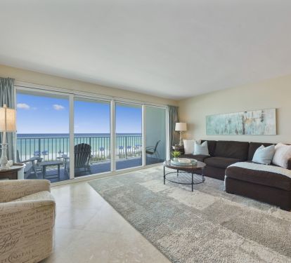 Enjoy breathtaking Gulf front views from this beautifully furnished beachfront condo featuring floor-to-ceiling sliding glass doors and a private balcony.