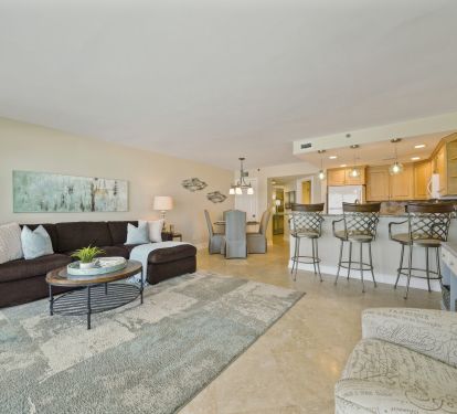 Unwind in this oceanfront condo with expansive balcony views, modern amenities, and a prime beachfront location.
