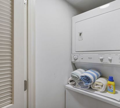 In-unit washer and dryer for added convenience during your beach vacation stay