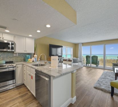 Whether you're preparing fresh seafood or quick snacks before heading to the sand, this fully equipped kitchen provides everything needed for a relaxing beach vacation.