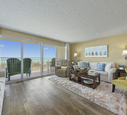 A bright and welcoming Gulf-view living room thats your perfect base for seaside lounging and sunset moments
