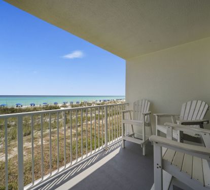 Relax on your private beachfront balcony just steps from the sand