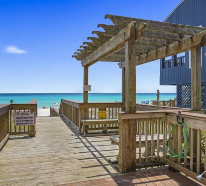 Cabana Club of Destin offers convenient beach entry with a private walkway and outdoor shower for easy cleanup.