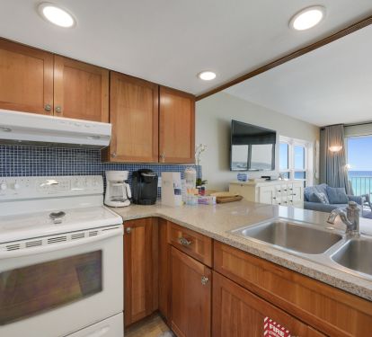 This bright Destin vacation rental features an open kitchen and living space designed for relaxing coastal stays.