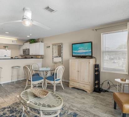 Living/Dining Area. Seating for 4 at the Table; additional Seating at Counter