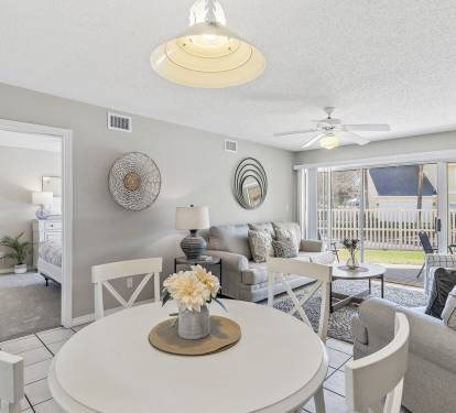Spacious Living Room and Dining Area Offering a View of the Neighborhood