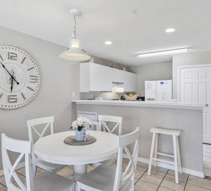 Dining Table Seats Four, plus Additional Counter Seating.'