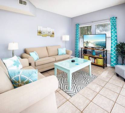 Living Room with walk out patio - 
Sandpiper Cove Resort 9106 Holiday Isle Destin Florida Vacation Rentals