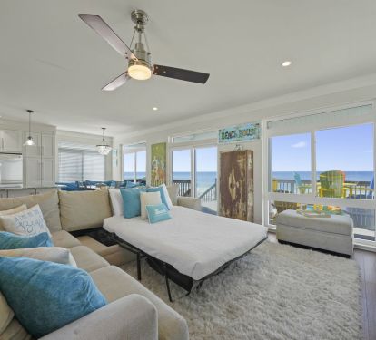 Fully furnished living room with gulf views