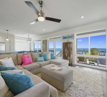 Fully furnished living room with gulf views