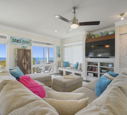 Fully furnished living room with gulf views