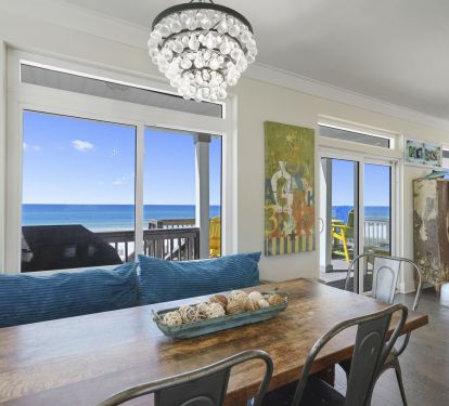 Dining room with plenty of seats for the whole family and stunning gulf views