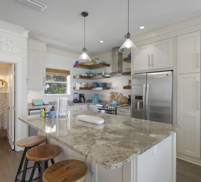 Full kitchen with 3 barstools