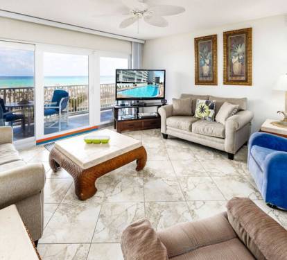 Living Room with Private Balcony - 
Islander Beach Condo Rentals, Okaloosa Island