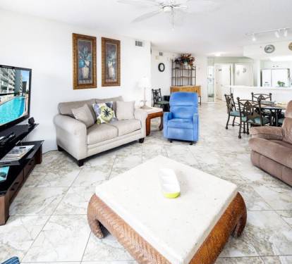 Living Room with Private Balcony - 
Islander Beach Condo Rentals, Okaloosa Island