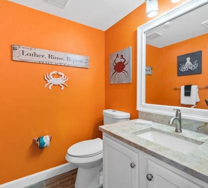Colorful bathroom with coastal accents and stylish design