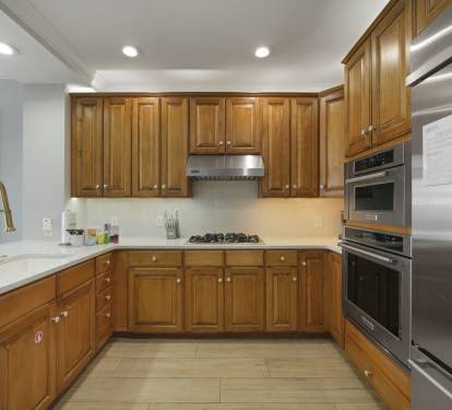 Full kitchen with stainless steel appliances