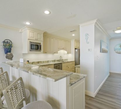 After a sunrise walk along the shore, return to prepare a relaxed breakfast in a space designed for easy vacation living.